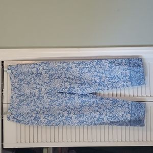 Ann Taylor size 8 ankle length pants. Light blue & white floral pattern.
